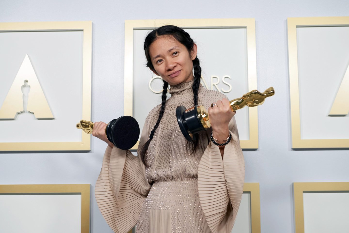 Director Chloé Zhao poses at the Academy Awards press room