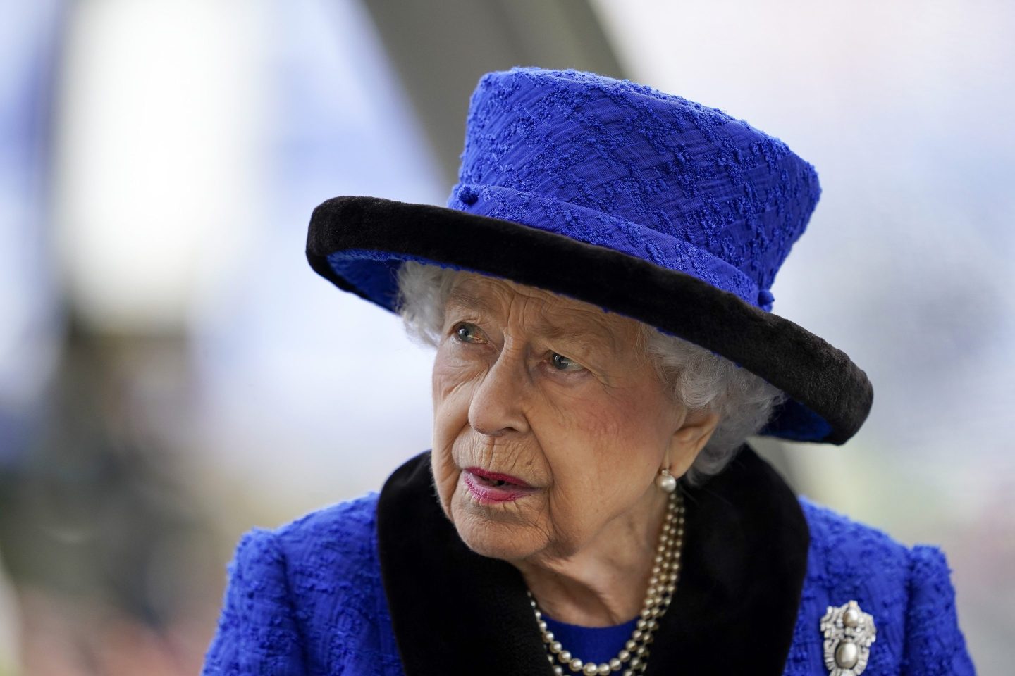 Queen Elizabeth II, seen here in October 2021, is 95 years old and has COVID-19.