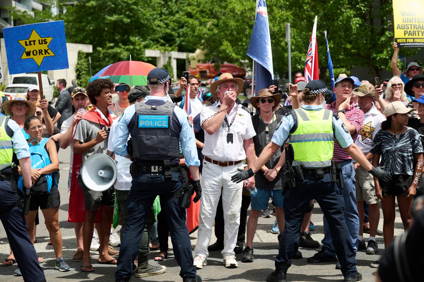 Anti-vaxxers block Australia’s capital as Canada’s COVID protest mayhem goes global