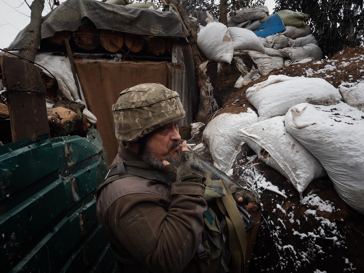 A soldier in the trenches fighting for Ukraine.