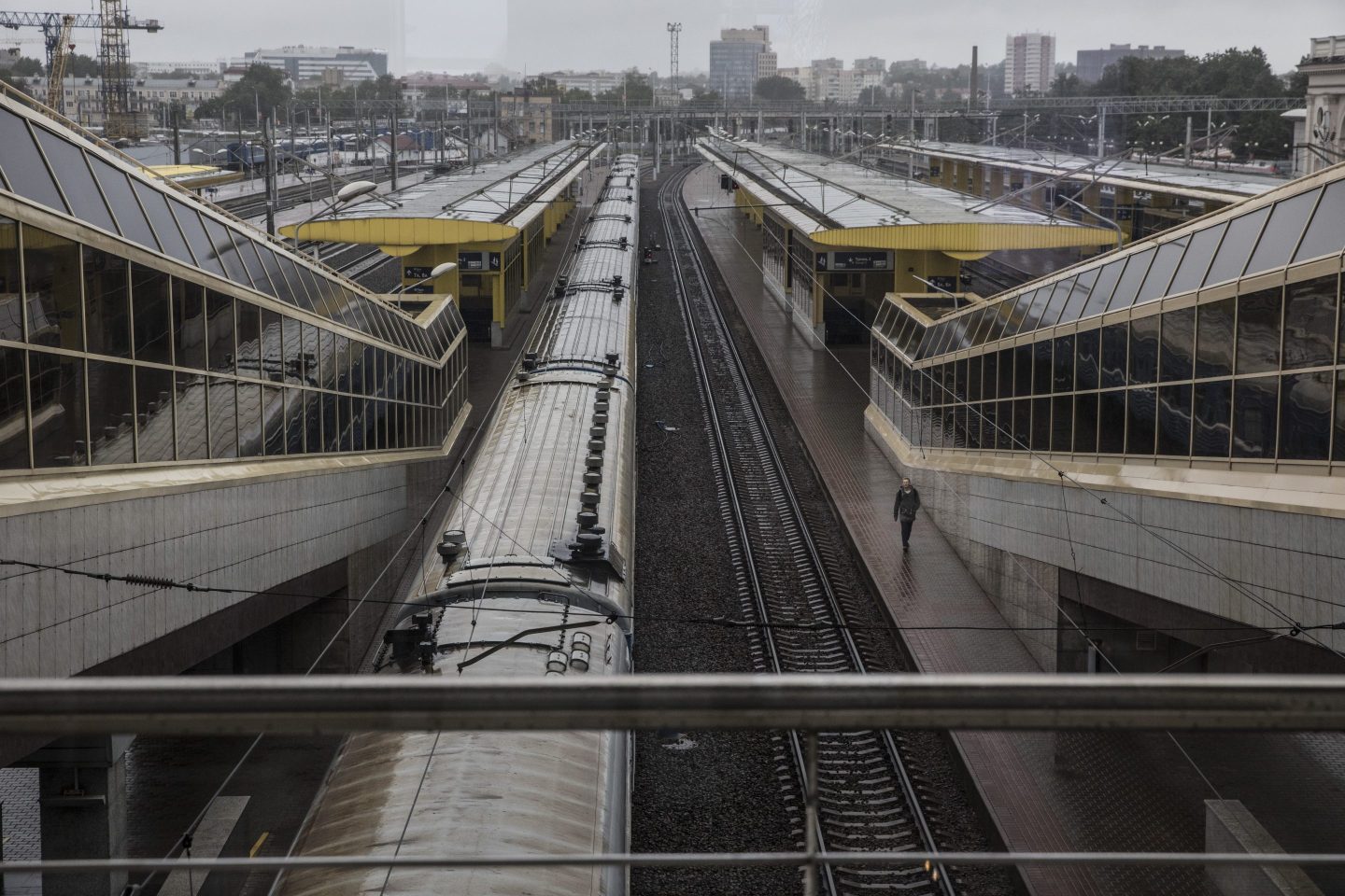 One train waits for passengers in the central train station in Minsk, Belarus