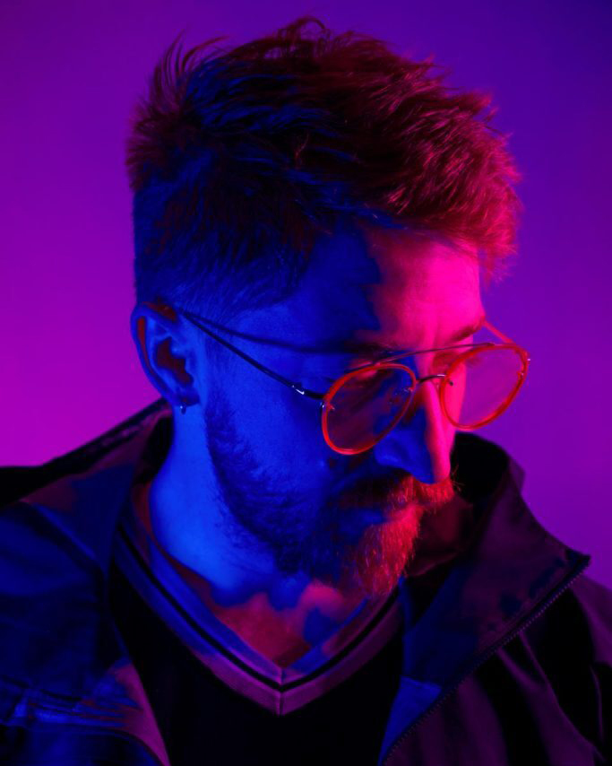 Portrait of Michah Dowback AKA Mad Dog Jones created an NFT collection worth $2.1 million. Here's how he did it.