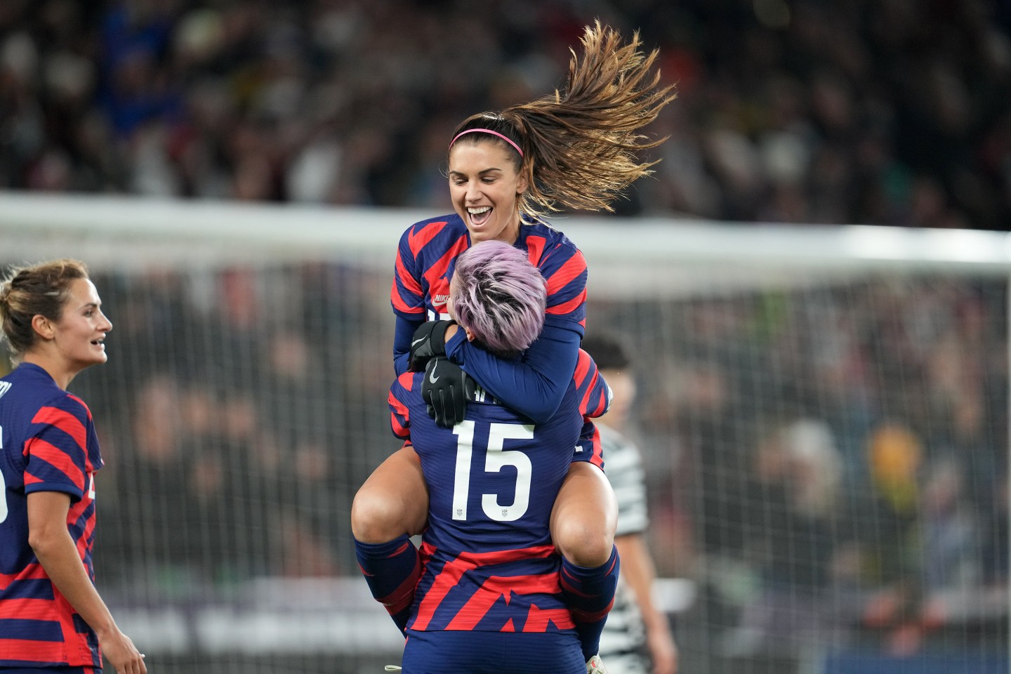 lex Morgan #13 of the United States celebrates after scoring a goal with Megan Rapinoe #15 during a game against Korea Republic at Allianz Field on October 26, 2021 in St. Paul, Minnesota.