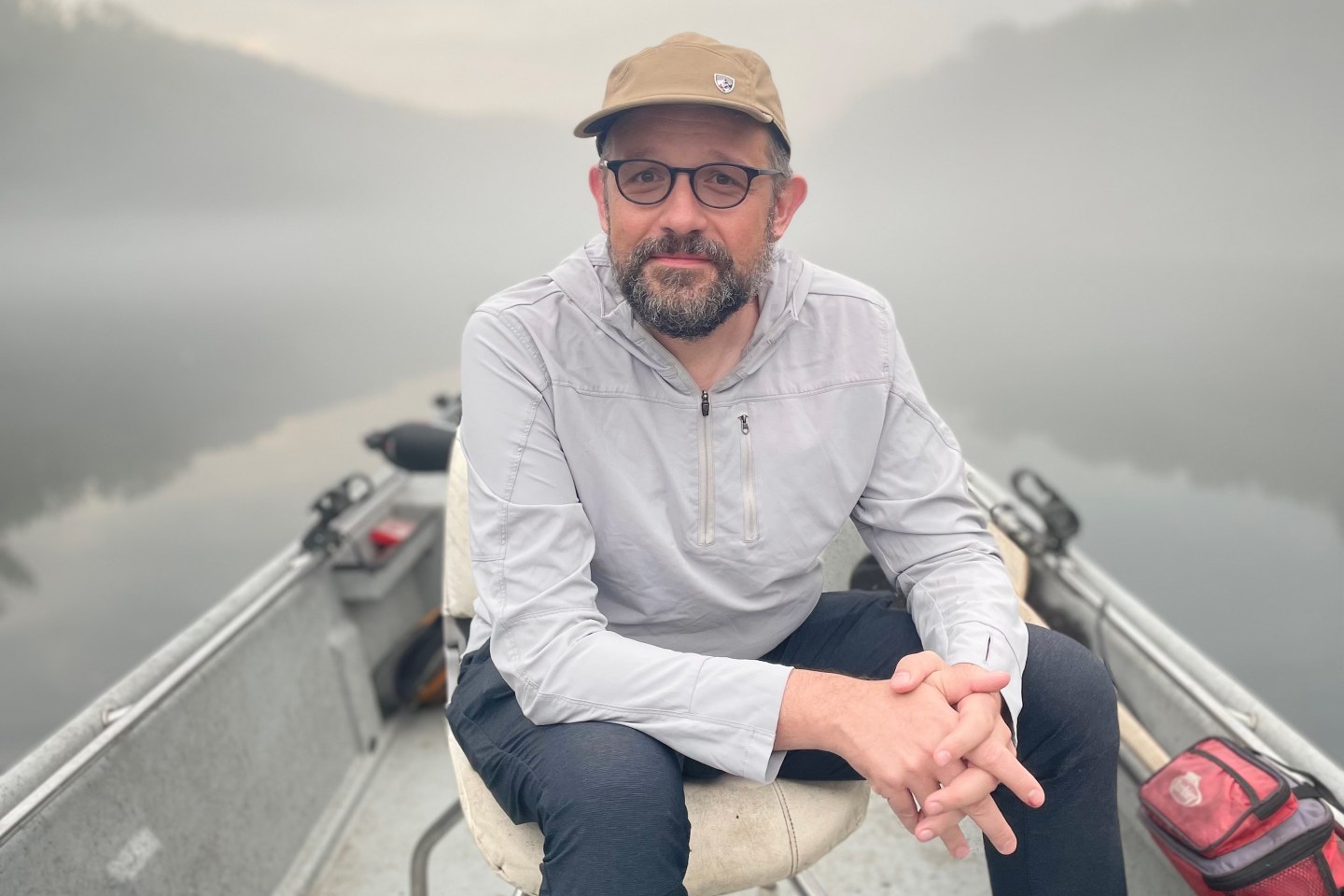 a portrait of Phil Libin in a boat