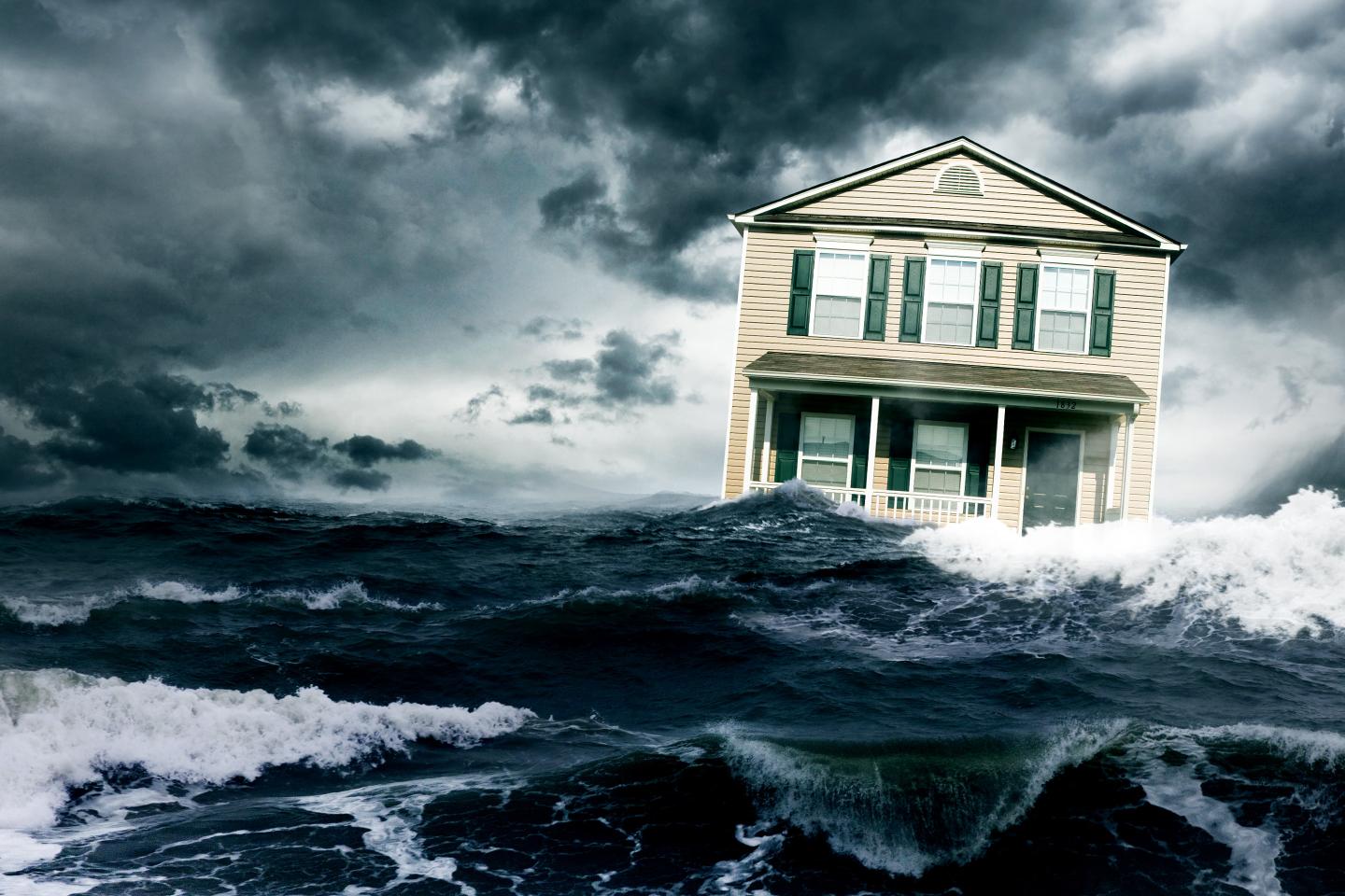 House floating in ocean amid a storm