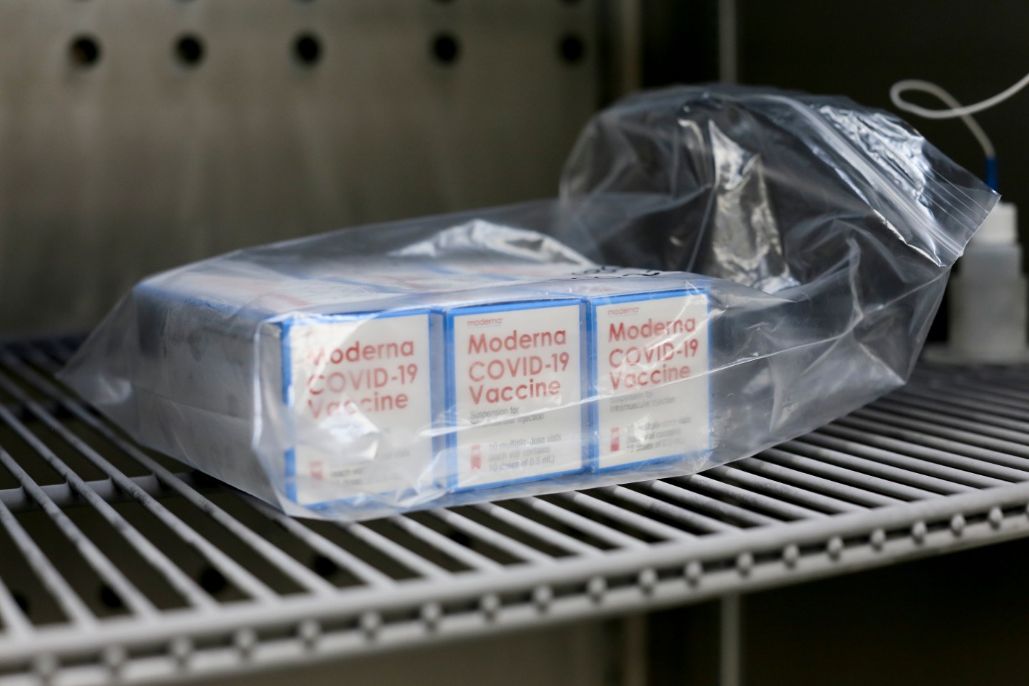Packages of the Moderna COVID-19 vaccine sit in cold storage Friday, Aug. 13, 2021, in the Cameron County Public Health's pharmacy in San Benito, Texas. As demand for COVID-19 vaccines collapses in many areas of the U.S., states are scrambling to use stockpiles of doses before they expire and have to be added to the millions that have already gone to waste.