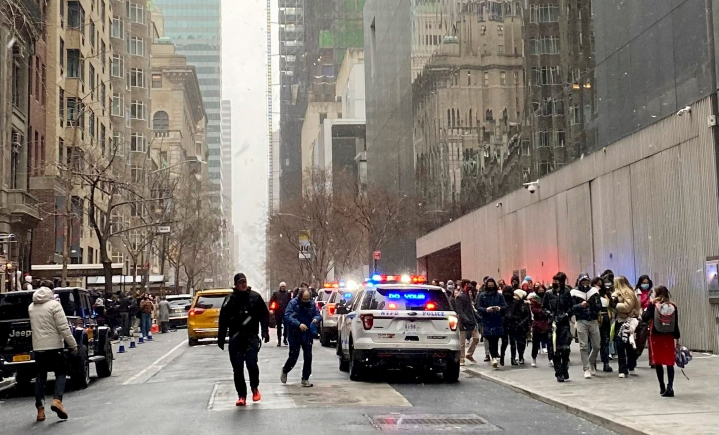 In this photo from a social media post by Scott Cowdrey, people are evacuated from the Museum of Modern Art where a stabbing occurred, Saturday, March 12 in New York. Police said two people were stabbed inside MoMA and in stable condition at Bellevue Hospital.