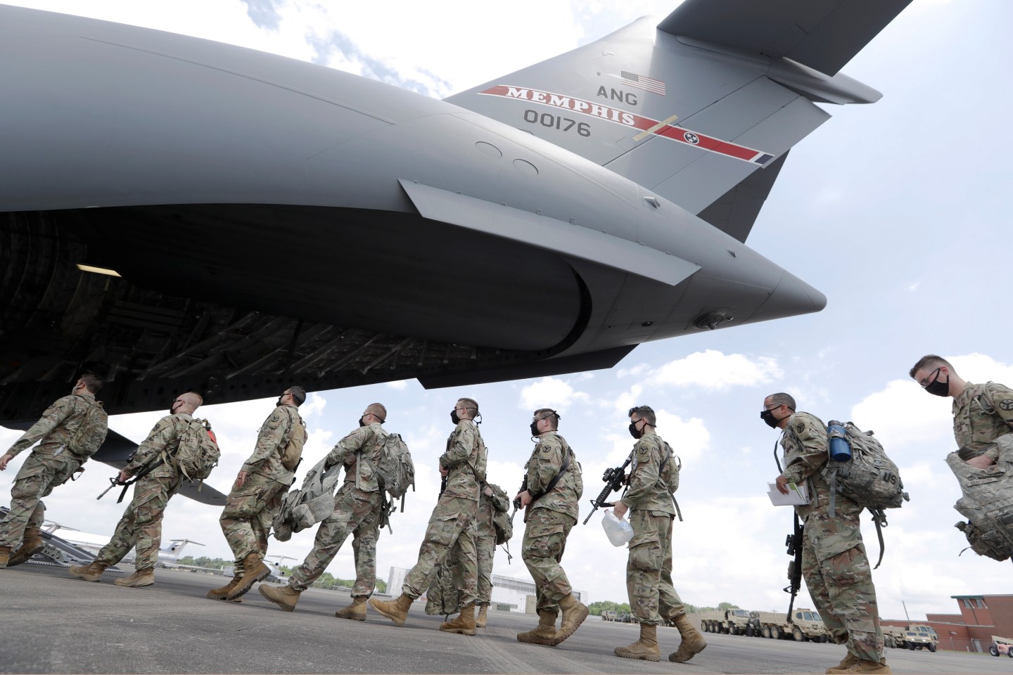 Tennessee National Guard troops board a plane in Smyrna, Tenn., to go to Washington, on June 4, 2020. Three current and former members of the Tennessee National Guard are “safe” and “accounted for,” despite a Russian newspaper’s false report, on March 17, 2022, that the men were killed while fighting in Ukraine.