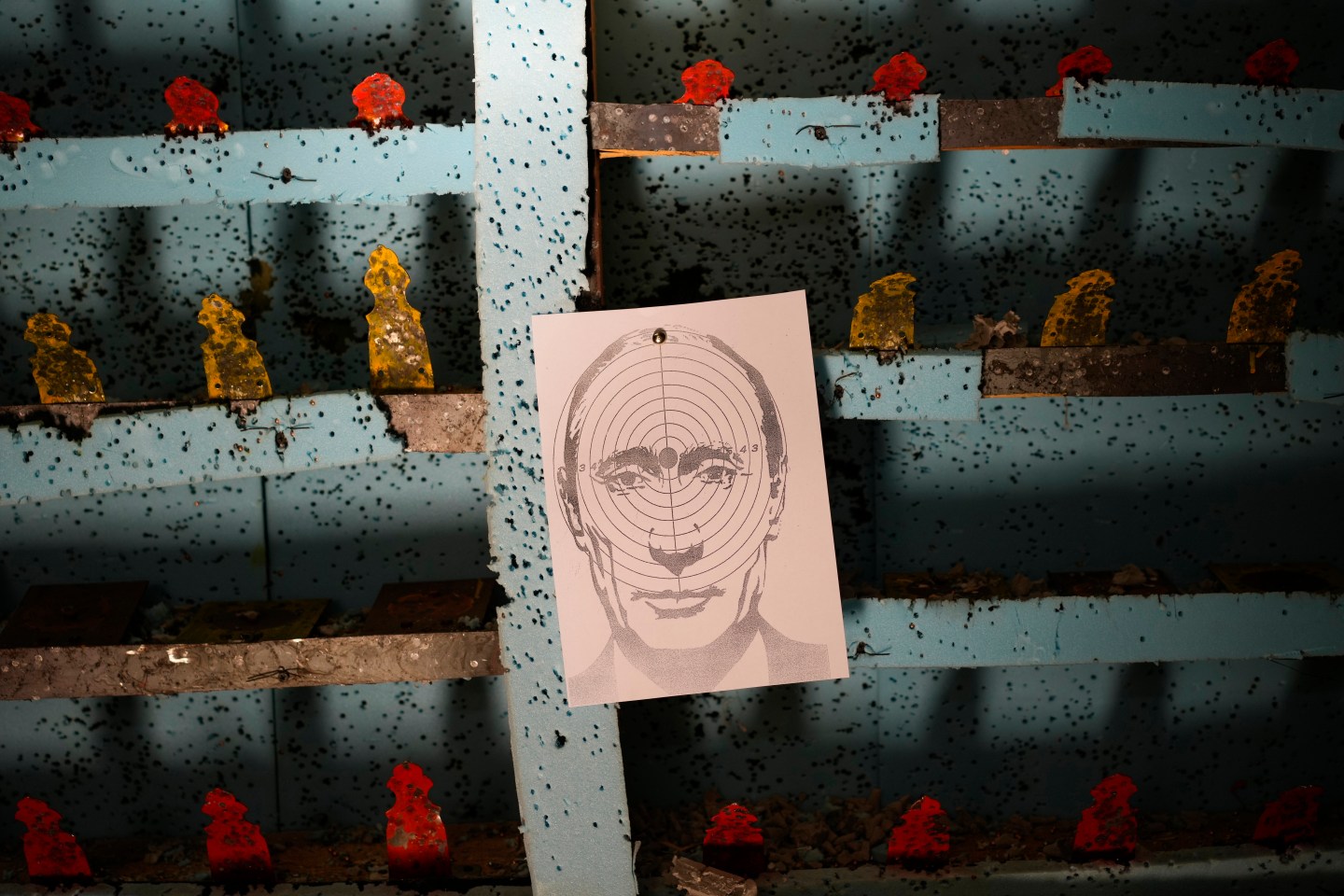 A picture of Russian President Vladimir Putin hangs at a target practice range in Lviv, Ukraine, March 17.