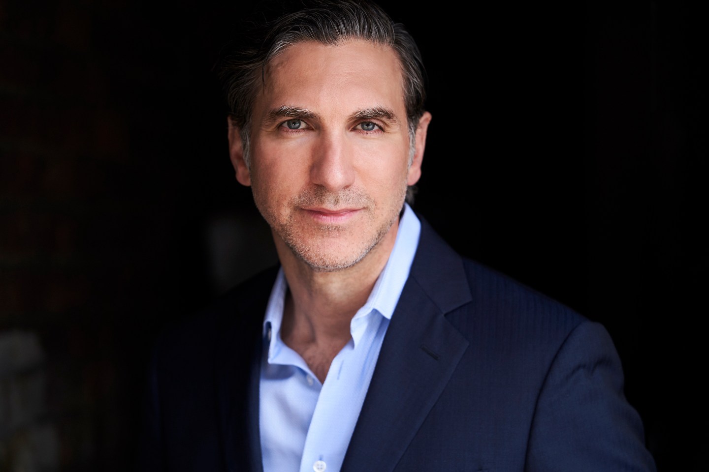 Headshot of Andrew Kiguel