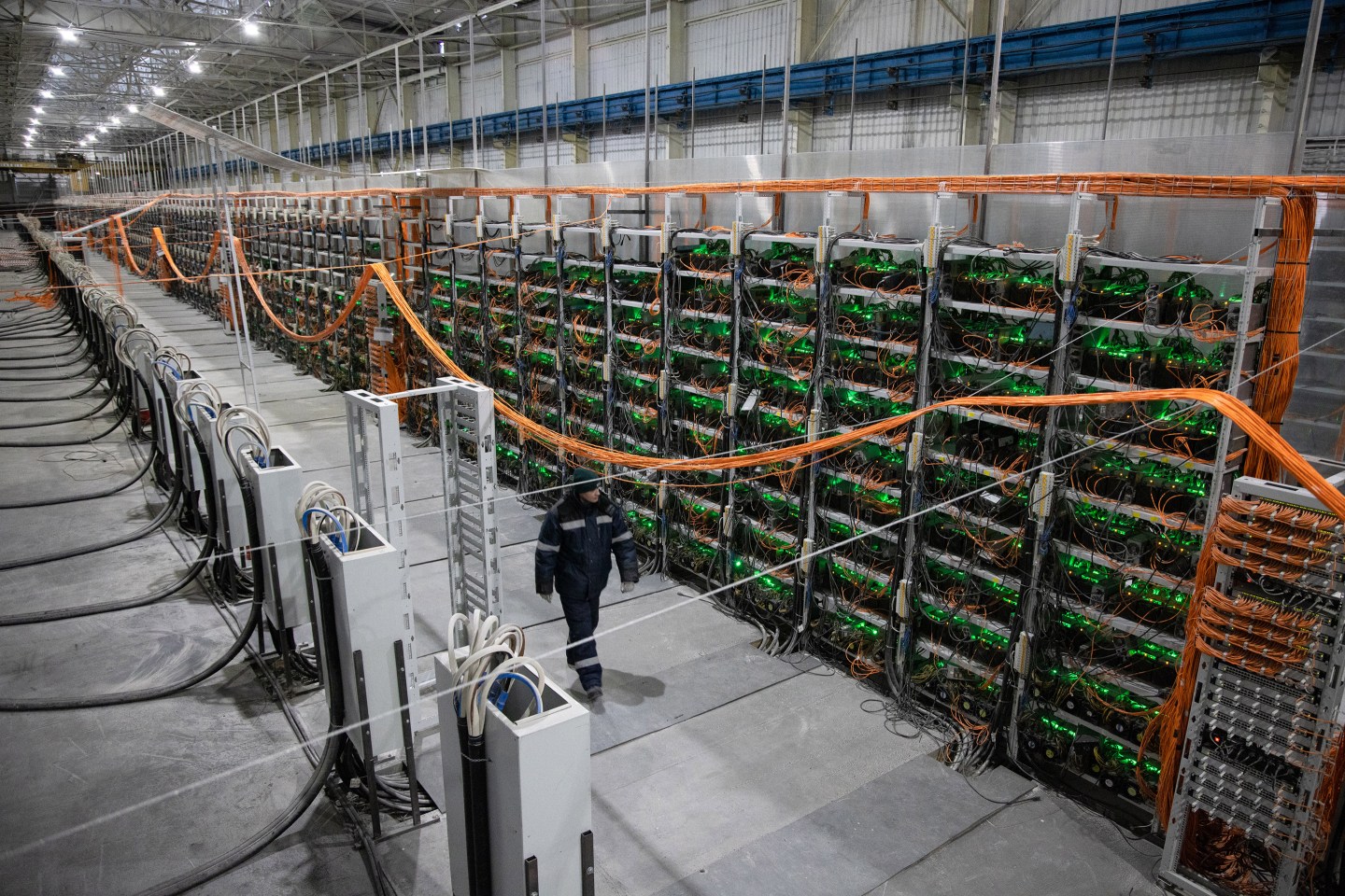 Racks of mining rigs at a Minto cryptocurrency mining center.