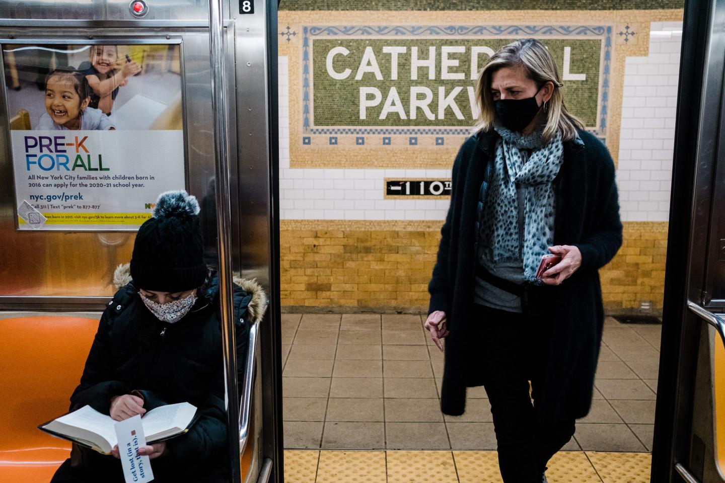 Commuters on a NYC subway