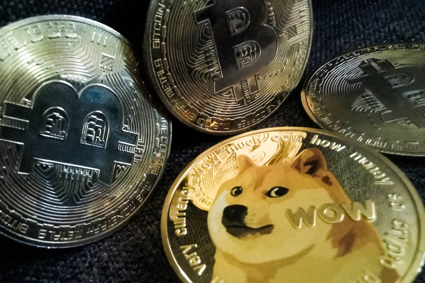An artistic representation of Bitcoin and Dogecoin
