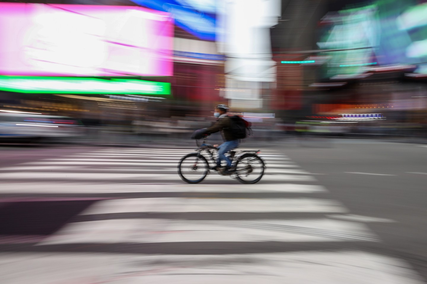 A food delivery guy with bicycle is seen at the Times Square in New York City, United States on Dec. 29, 2021.