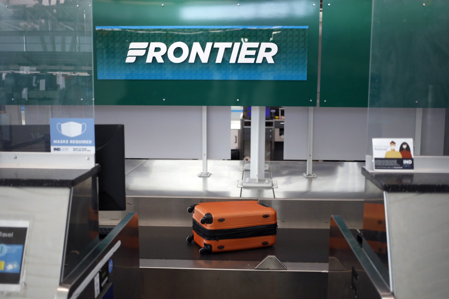 Suitcase at Frontier ticketing booth