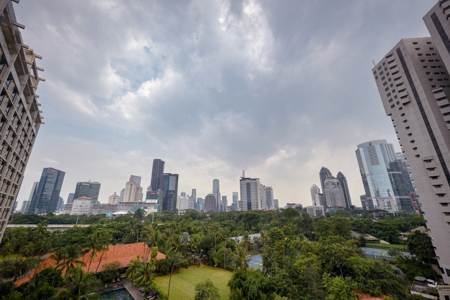 This general view shows the skyline of the city centre in Jakarta on February 16, 2022, seen from the location where the G20 finance ministers' meeting will take place on February 17-18. (Photo by BAY ISMOYO / POOL / AFP) (Photo by BAY ISMOYO/POOL/AFP via Getty Images)
