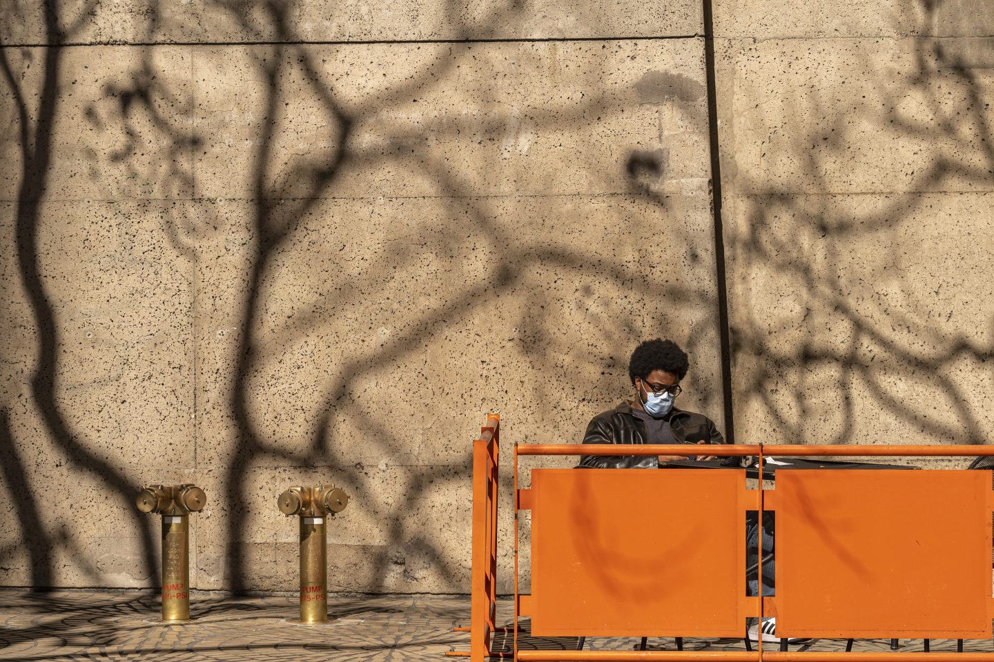 A diner wears a protective mask outside a restaurant in San Francisco
