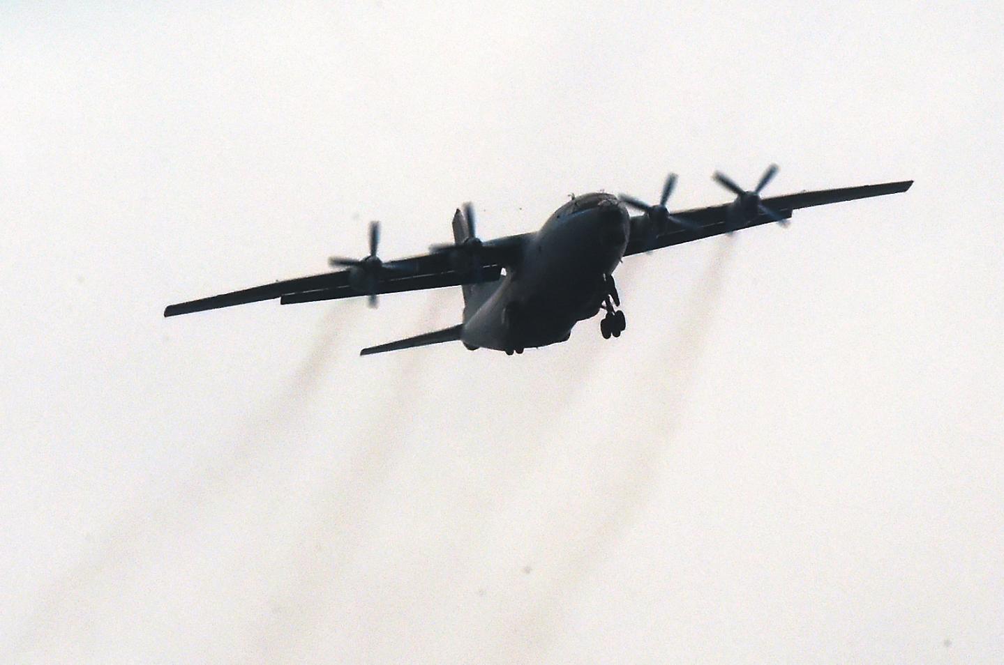 A military plane flies in Russia's Rostov region, some 70 km from the Ukrainian border and the self-proclaimed Donetsk People's Republic, on Feb. 27, 2022.