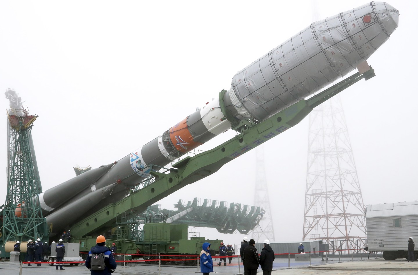 KAZAKHSTAN MARCH 2, 2022: A Soyuz-2.1b rocket booster with a Fregat upper stage carrying British OneWeb satellites is being installed on a launch pad at the Baikonur Cosmodrome.