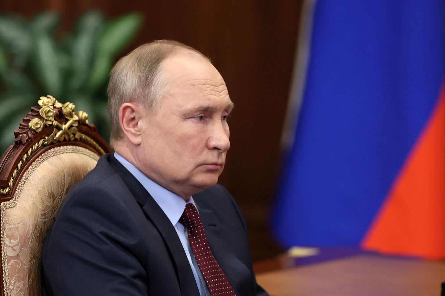 Russian President Vladimir Putin attends a meeting with the head of Russia's Union of Industrialists and Entrepreneurs, a big business lobby group, at the Kremlin in Moscow on March 2, 2022.