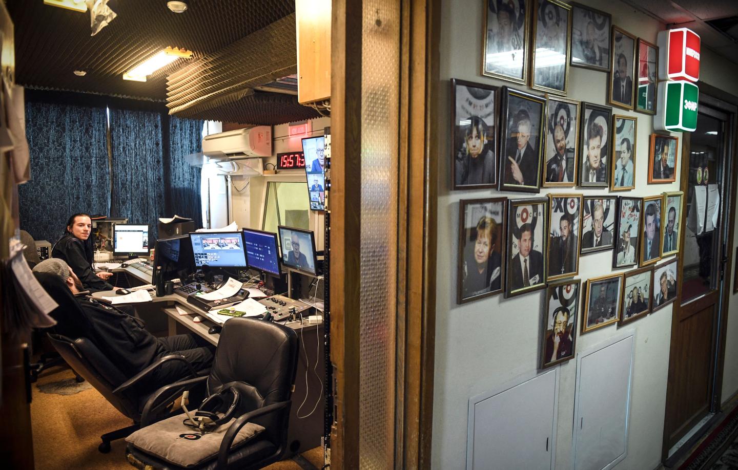 Technicians sit in a room at the office of Echo of Moscow radio in Moscow on March 3, 2022. The independent Russian radio Ekho Moskvy (Echo of Moscow), a historic figure in the Russian media landscape, announced Thursday its self-dissolution, after its ban from antenna by the authorities because of its coverage of the invasion of Ukraine. Ekho Moskvy, majority owned by the gas giant Gazprom, was born in 1990 during the last collapse of the Soviet Union, establishing itself as one of the most respected media in the country.