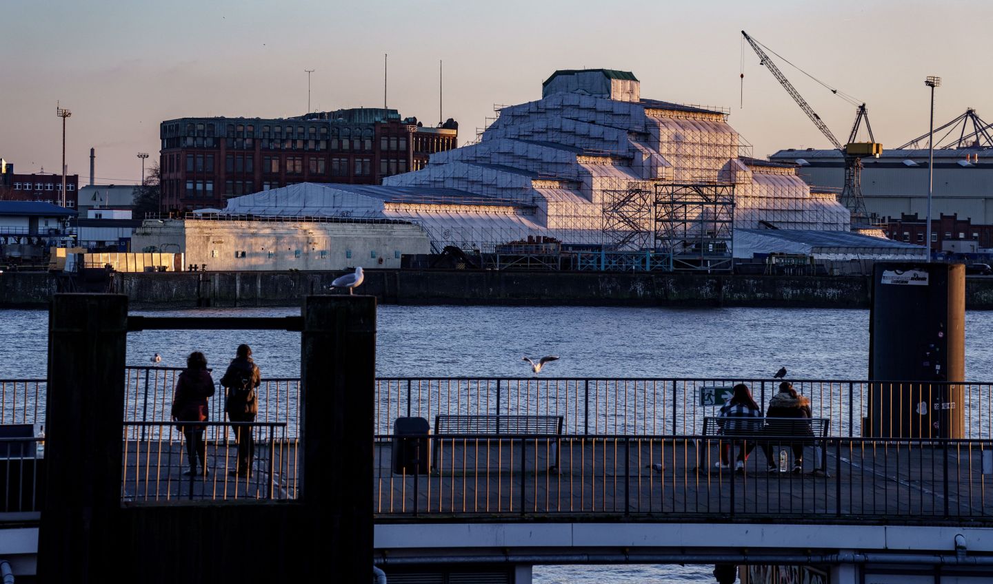 The yacht "Dilbar," covered with plastic sheets and believed to be owned by a Russian oligarch, is docked in a shipyard of Blohm &amp; Voss in the harbour of Hamburg, on the evening of March 3, 2022.