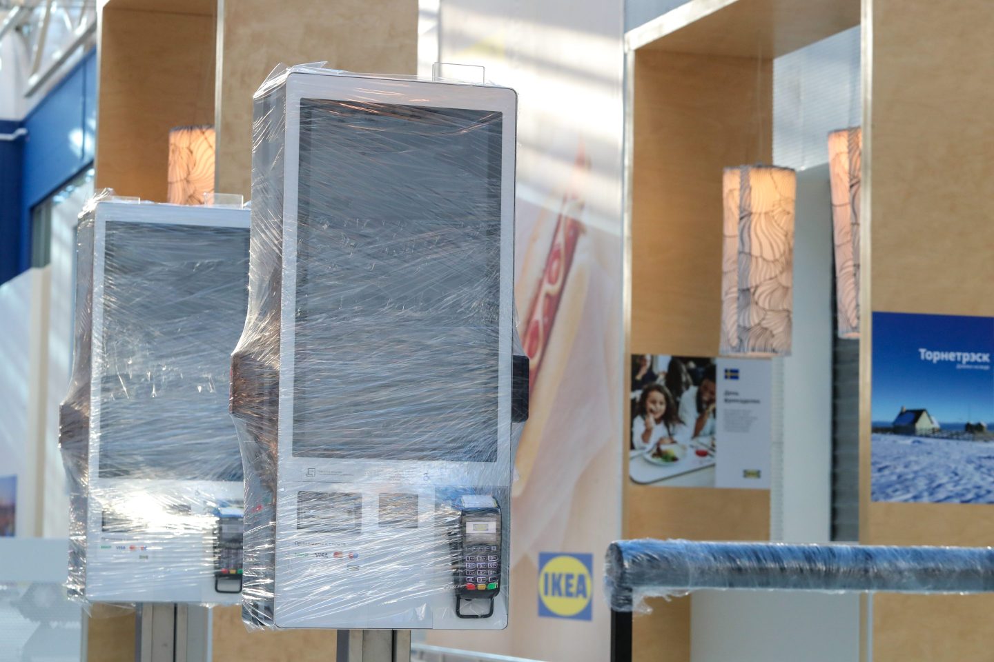 Ikea self-service check outs wrapped in saran wrap.