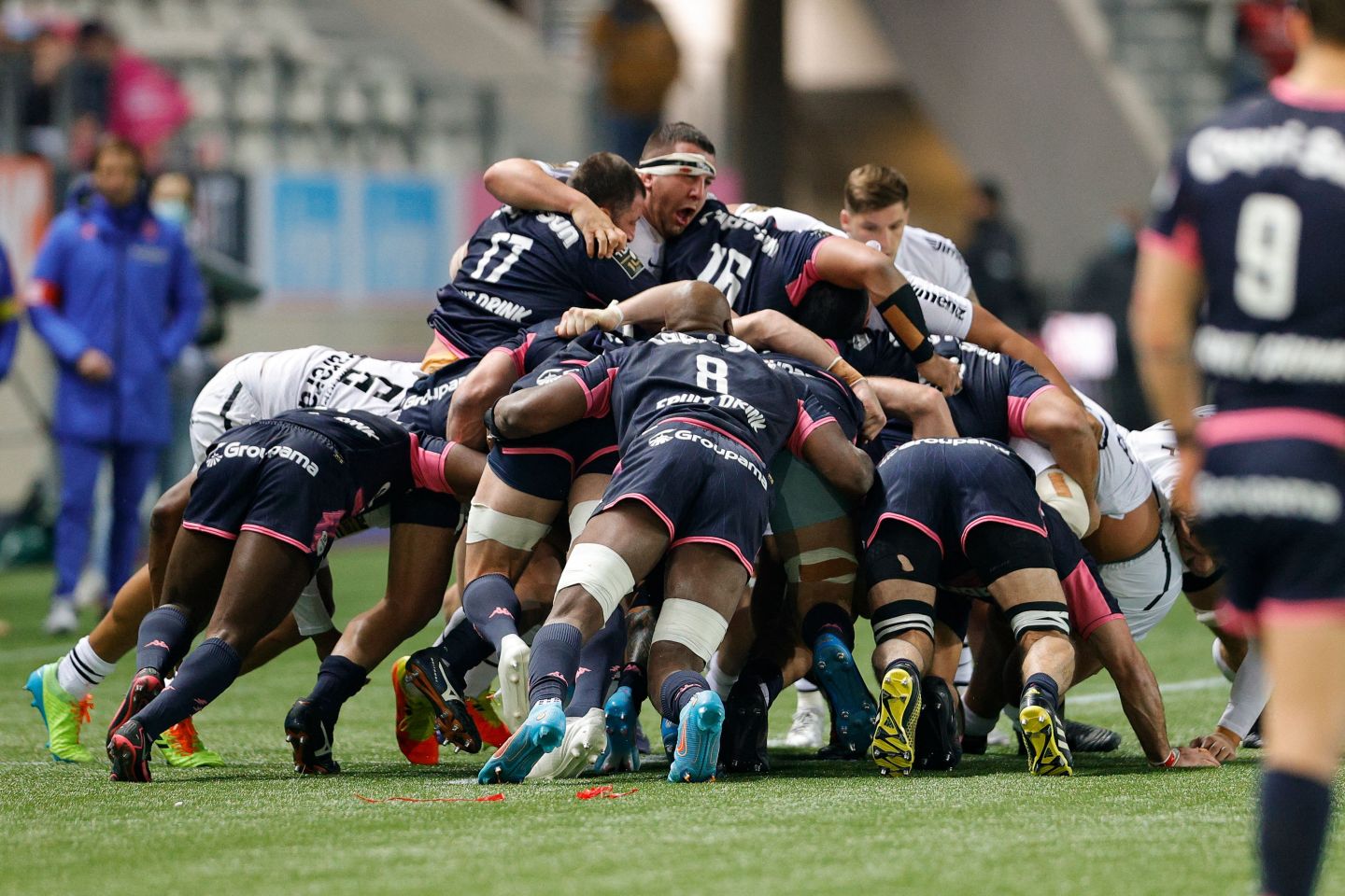 Photo of a rugby scrum.