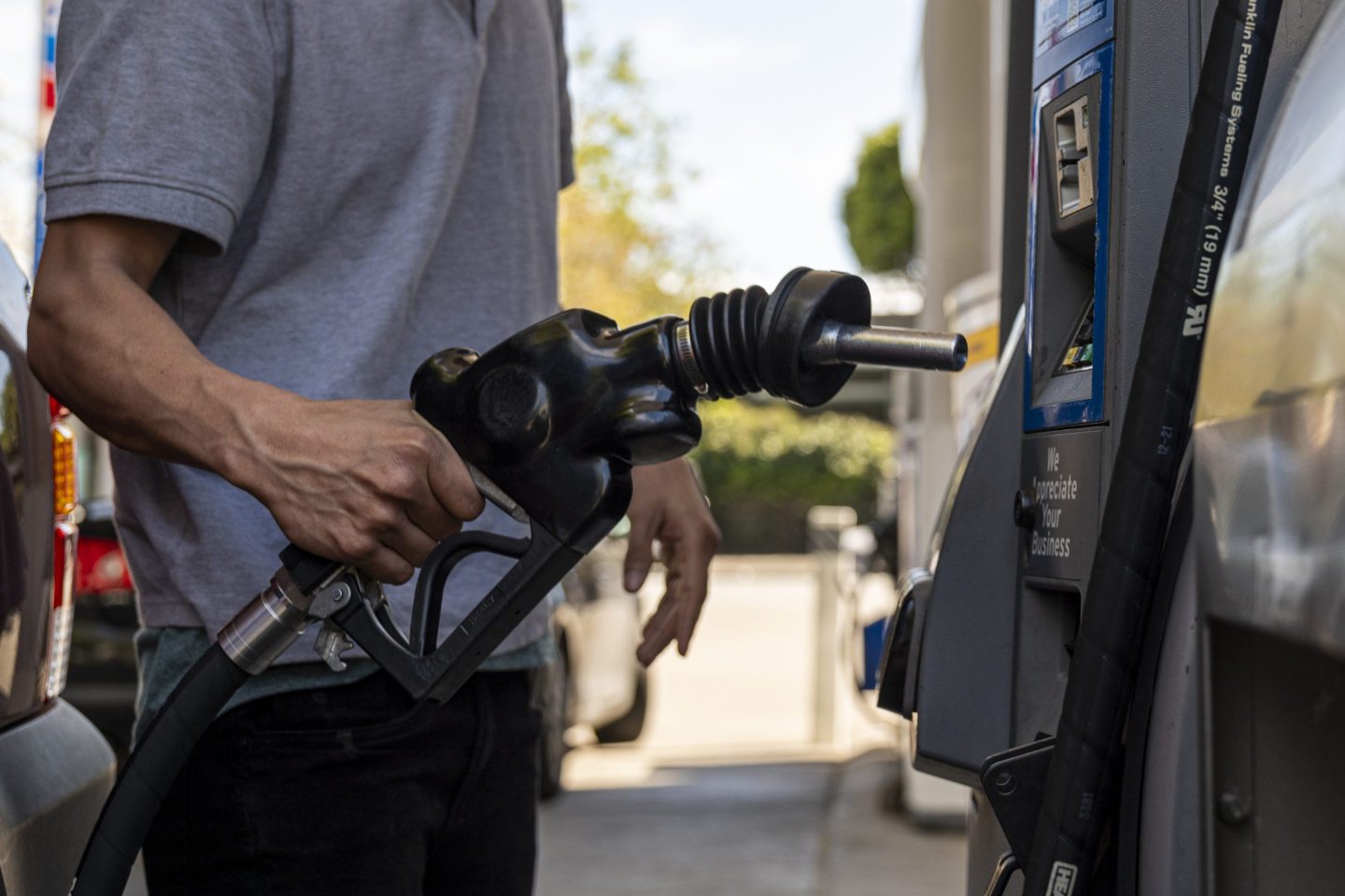 A man pumping gasoline in San Francisco
