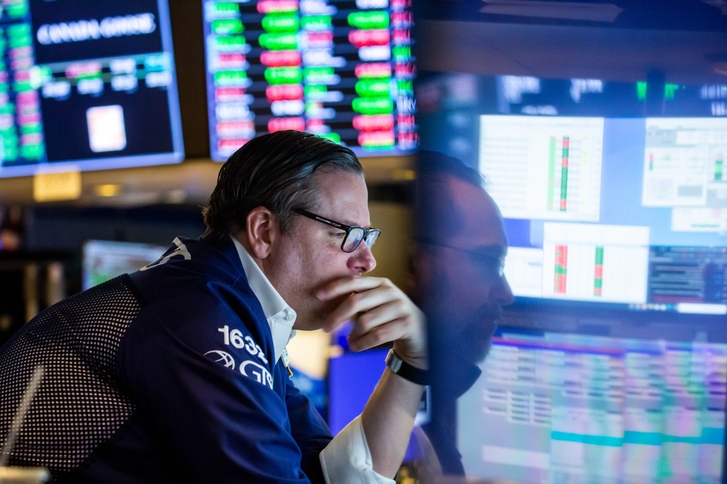 A trader works on the floor of the New York Stock Exchange.