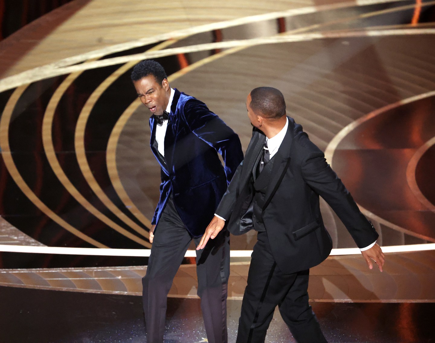 Chris Rock and Will Smith onstage during the show at the 94th Academy Awards.