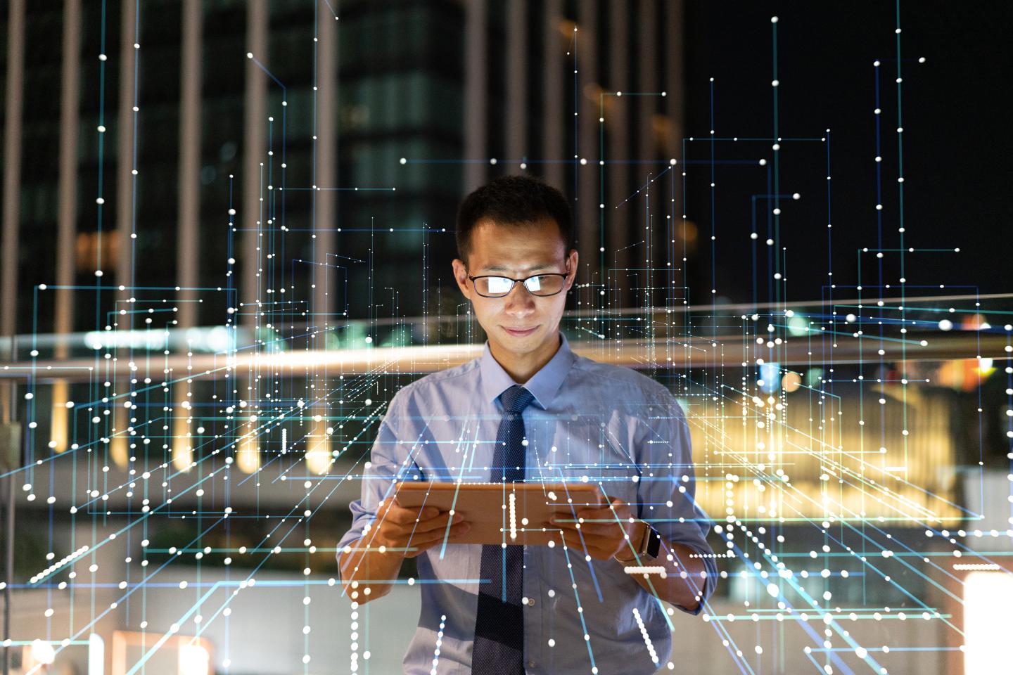 Man holding tablet with 5G network.