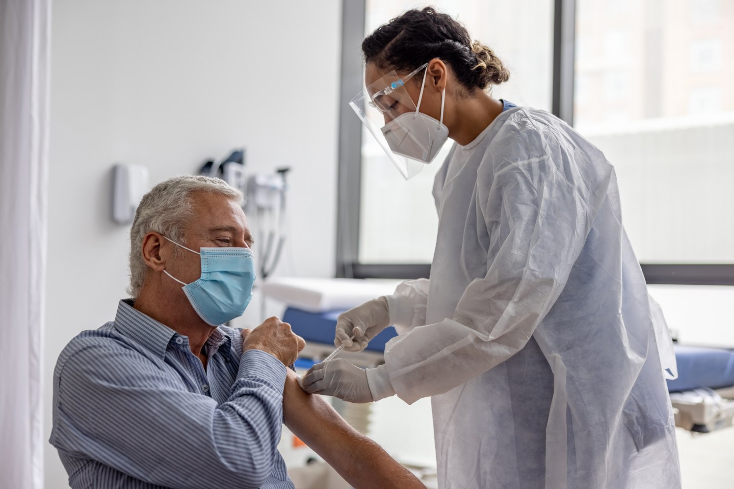 A man getting a COVID vaccine.