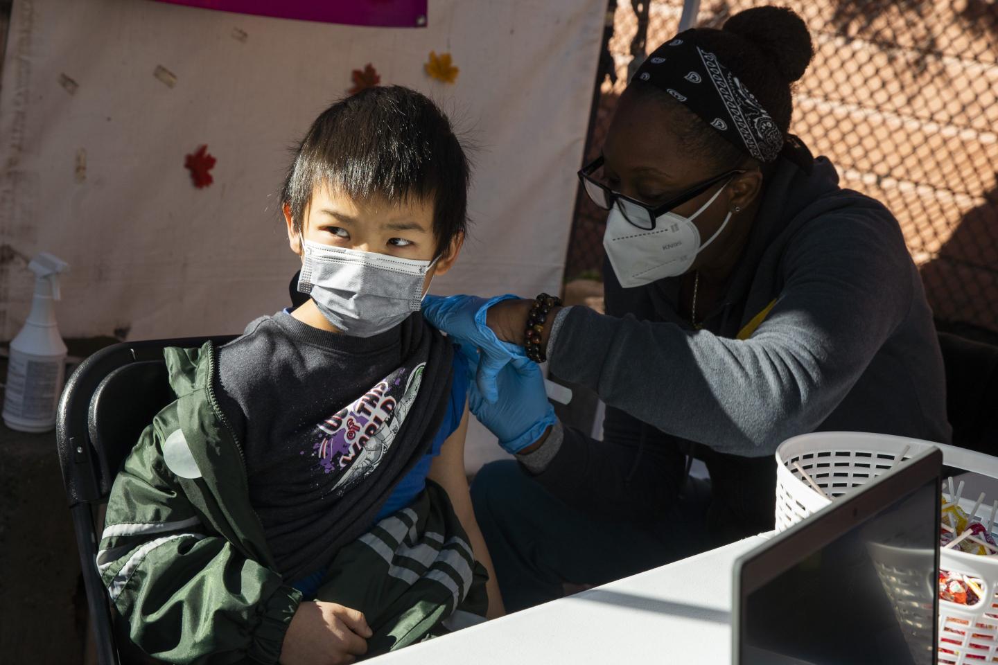 Child gets vaccinated against COVID