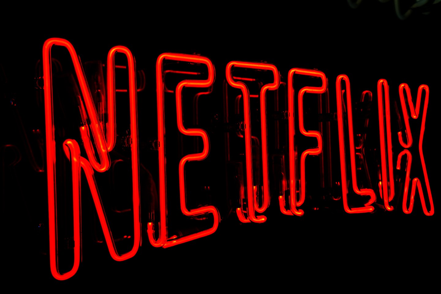 A Netflix logo is seen during the HOM temporary store opening to launch the new HOM Collection, the first line of home products for LGBT and families, as Netflix promotes the movie 'Il Filo Invisibile' on March 03, 2022, in Milan, Italy. Netflix announced Sunday that it was shuttering operations in Russia, one of the largest media companies to do so since the invasion.