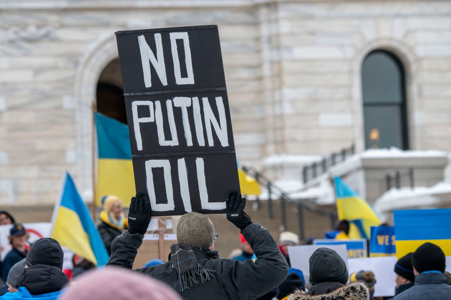 People rally to support the Ukrainian people and Ukraine's sovereignty and stop the war that Russia is waging against them.