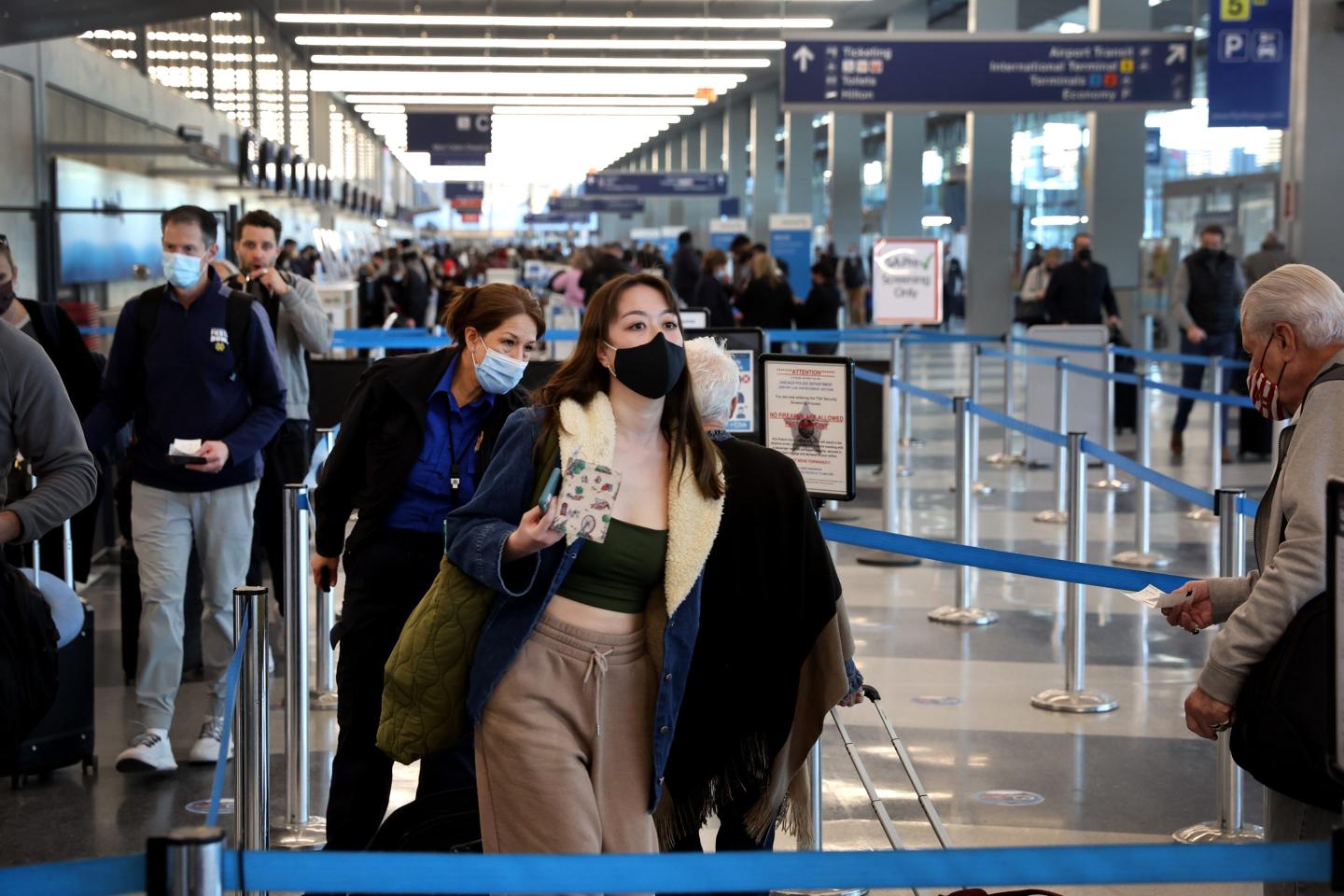 People going through TSA screening