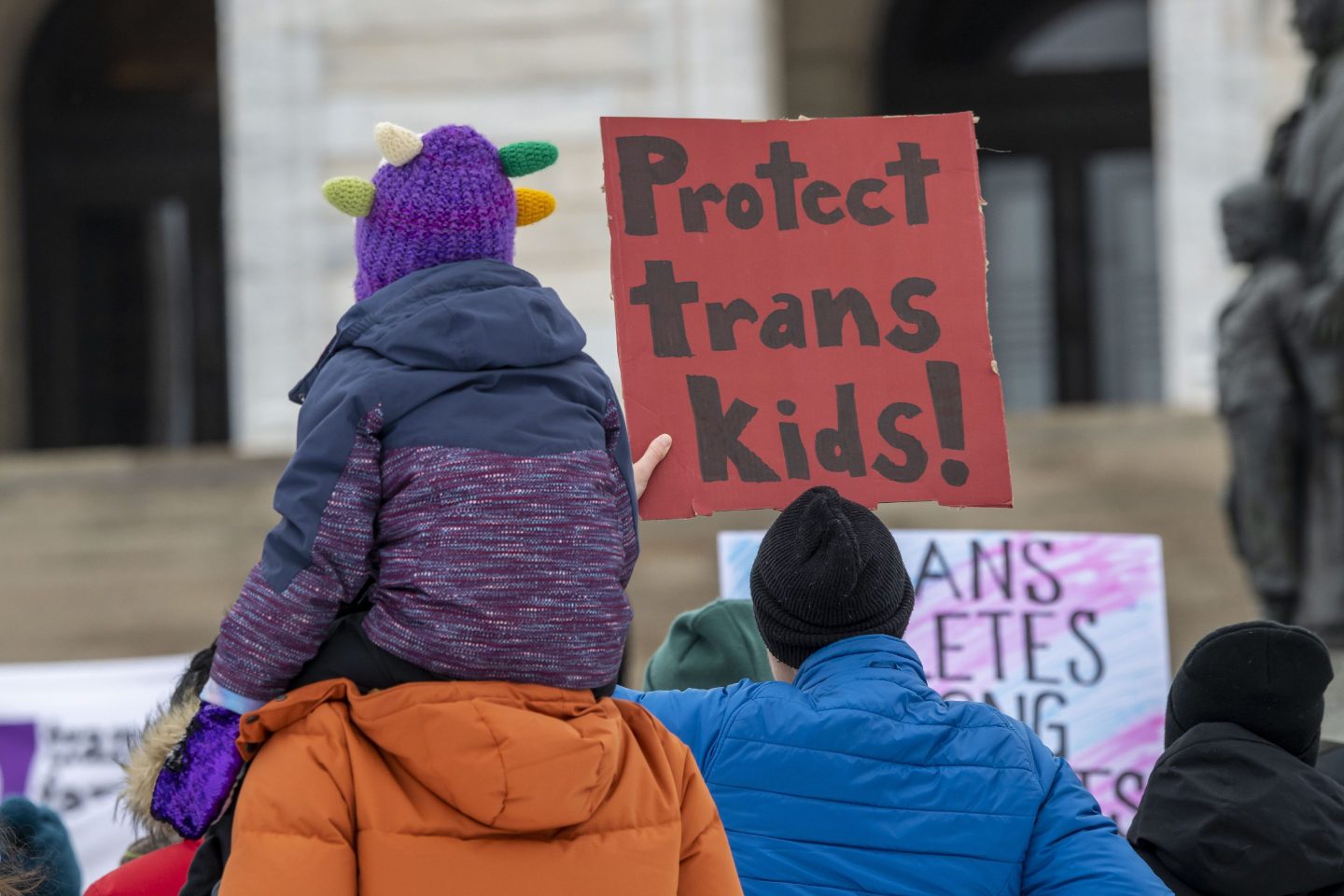 Demonstrators gather in Minnesota, Texas, on March 6, to protest against anti-transgender legislation in Texas and around the country.