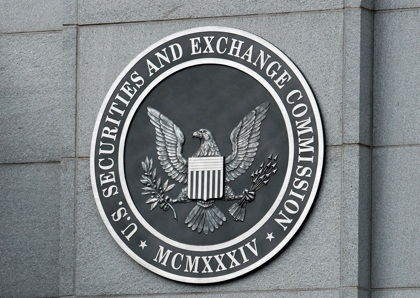 The U.S. Securities and Exchange Commission seal hangs on the facade of its building