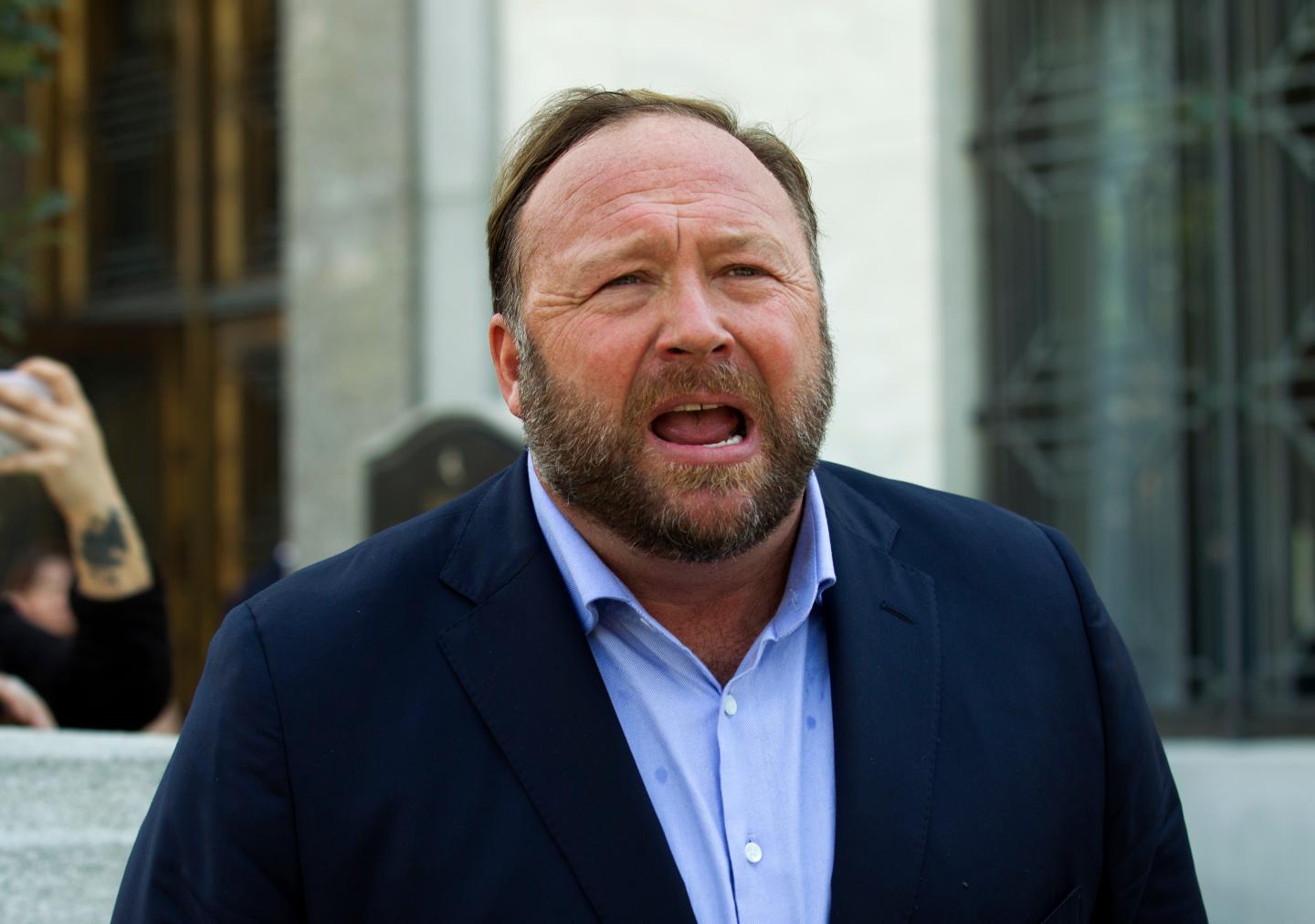 What Infowars’ bankruptcy filing means for Sandy Hook families who sued Alex Jones for calling school massacre a hoax