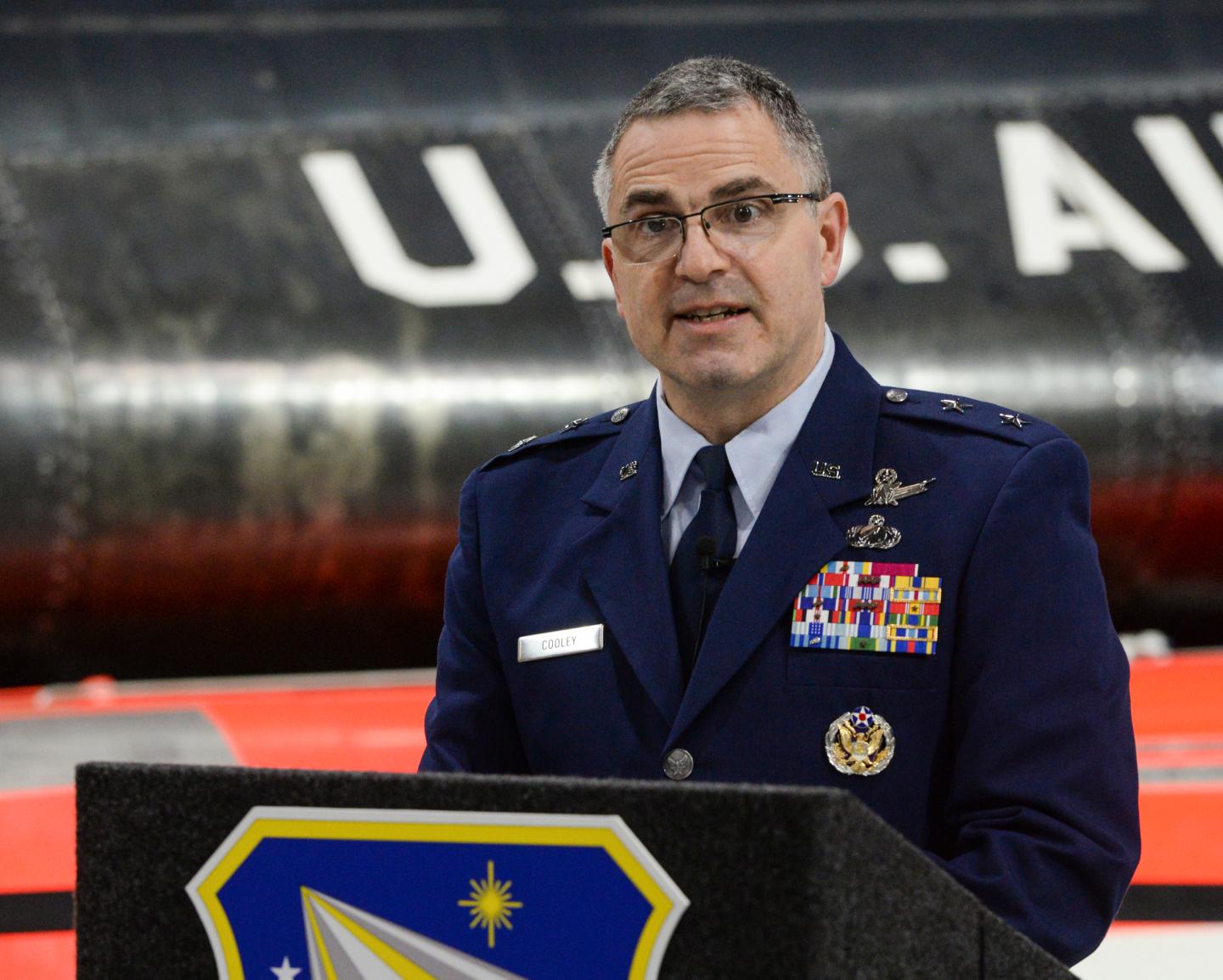 U.S. Air Force Maj. Gen. William T. Cooley, Air Force Research Laboratory commander, delivers remarks during a press conference inside the National Museum of the United States Air Force, Wright-Patterson Air Force Base, Ohio, on April 18, 2019. Cooley, has been convicted, Saturday, April 23, 2022, by a military judge of one of three specifications of abusive sexual contact in the first-ever military trial of an Air Force general.   