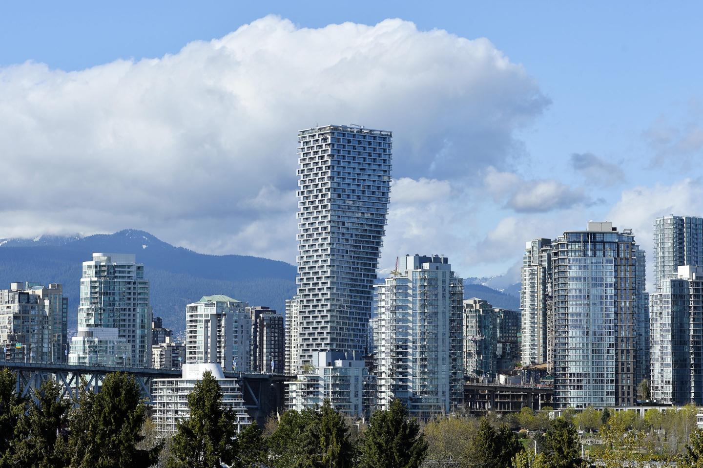 The Vancouver House building stands under construction in Vancouver, British Columbia.
