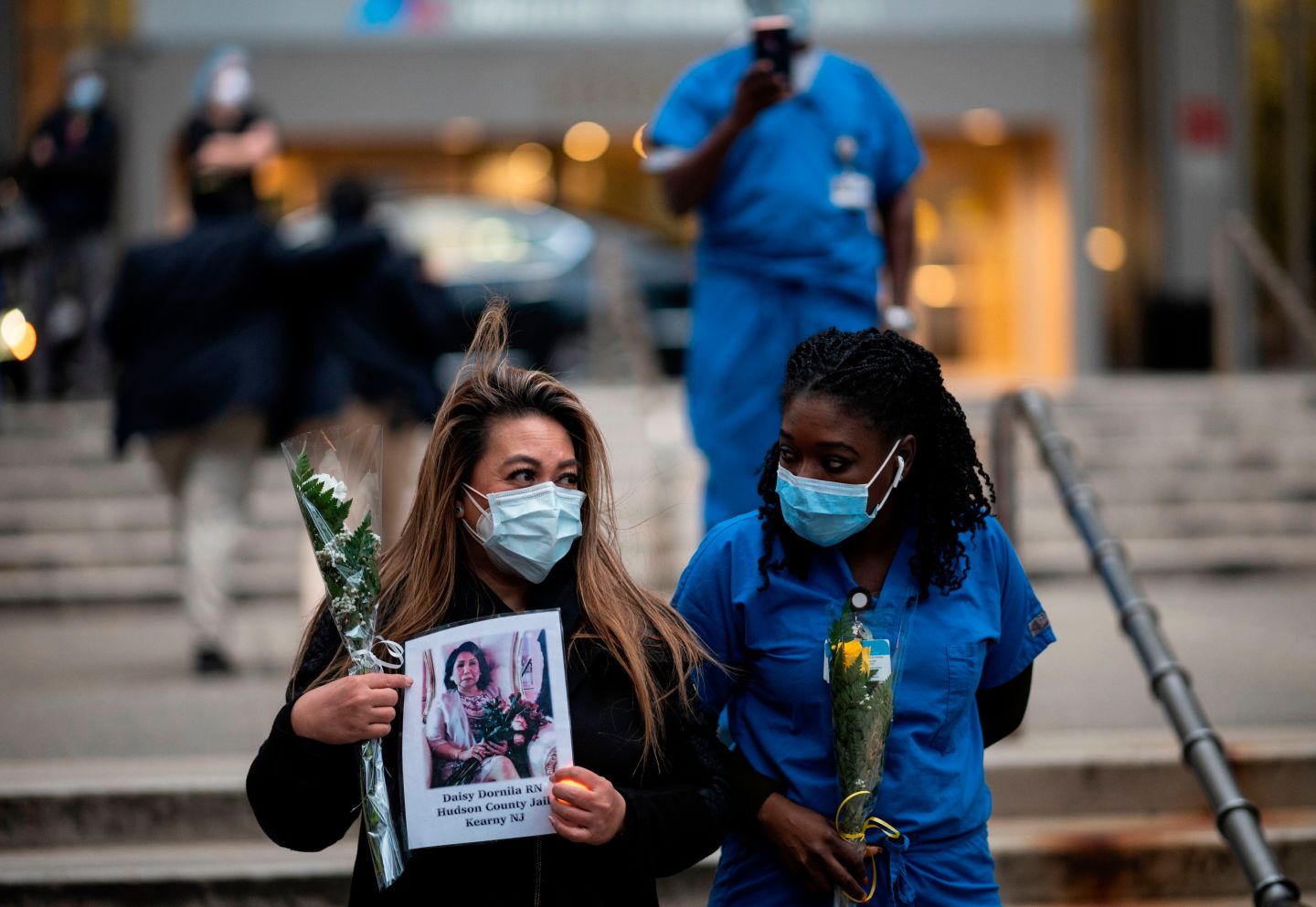 Nurses and healthcare workers remember their colleagues who died of the virus during a demonstration outside Mount Sinai Hospital in Manhattan on Apr. 10, 2020, in New York City.