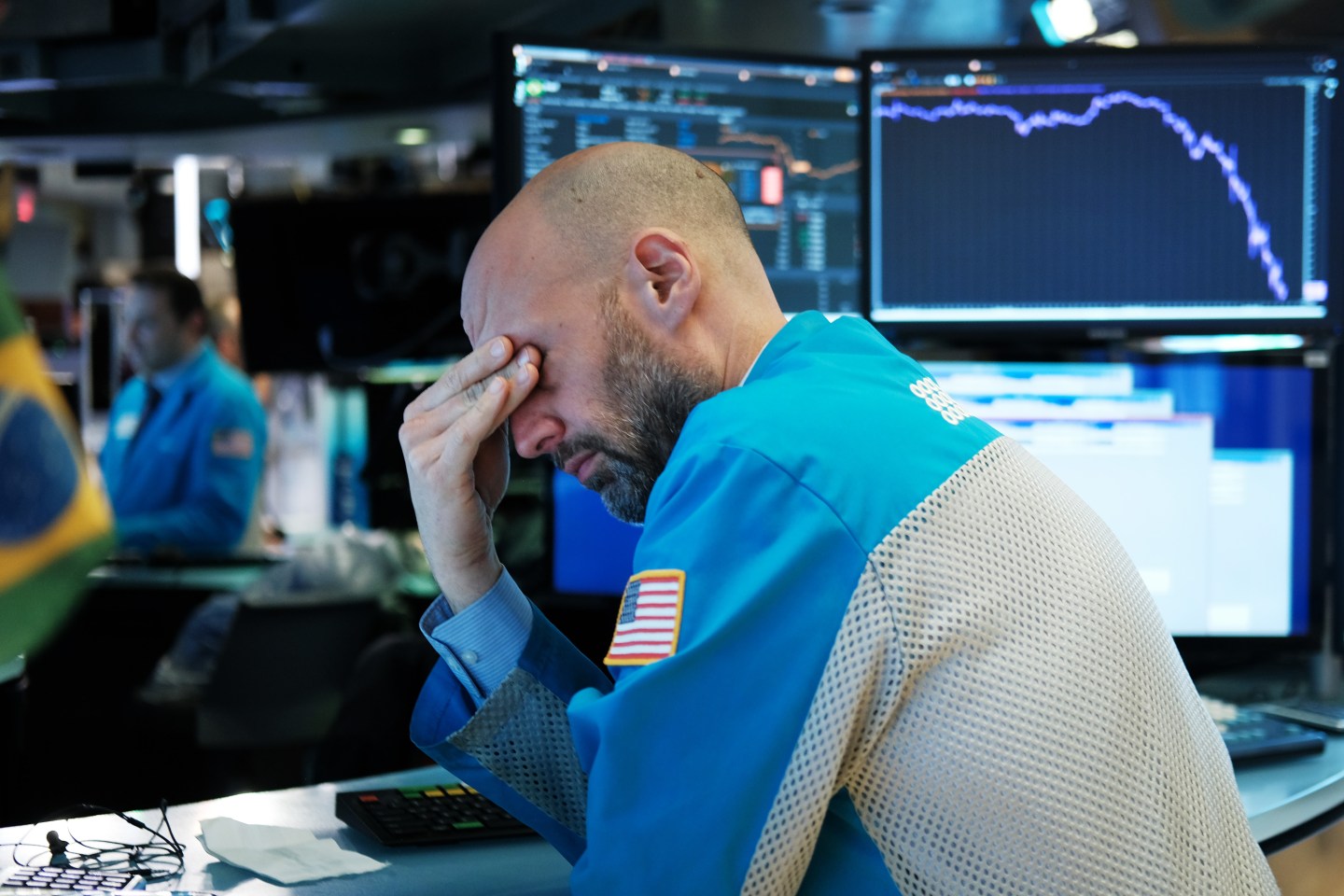 A trader on the floor of the New York Stock Exchange