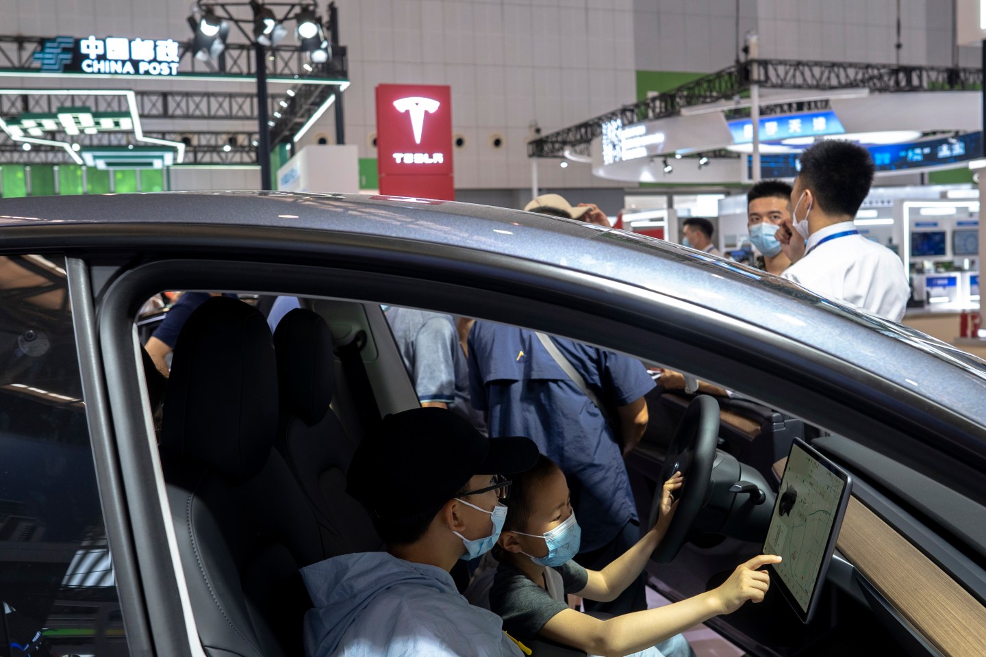 Two kids in the driver's cab, have shown great interest in