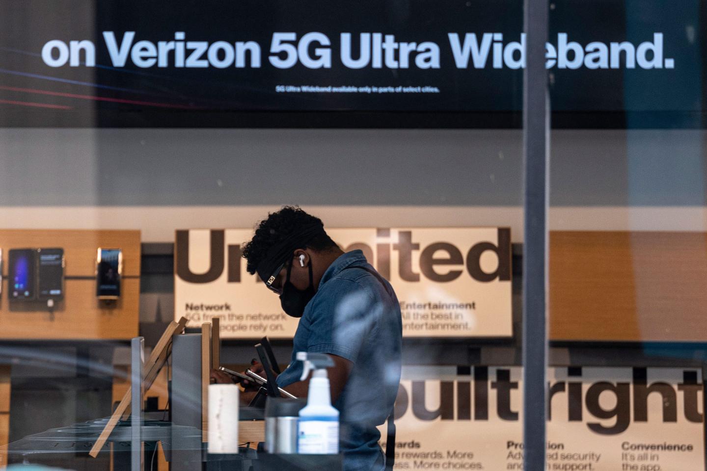 Verizon worker inside store