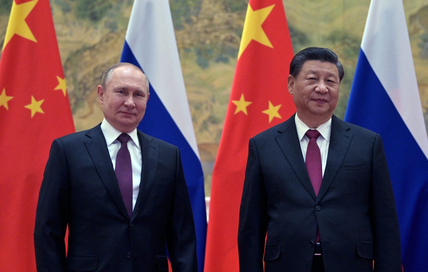 Russian President Vladimir Putin and Chinese President Xi Jinping pose during their meeting in Beijing, on Feb. 4, 2022. Later that month, Russia started its ongoing invasion of neighboring Ukraine.