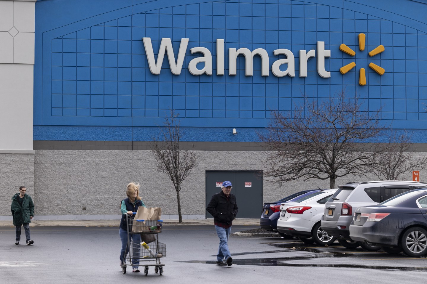 Shoppers outside a Walmart store