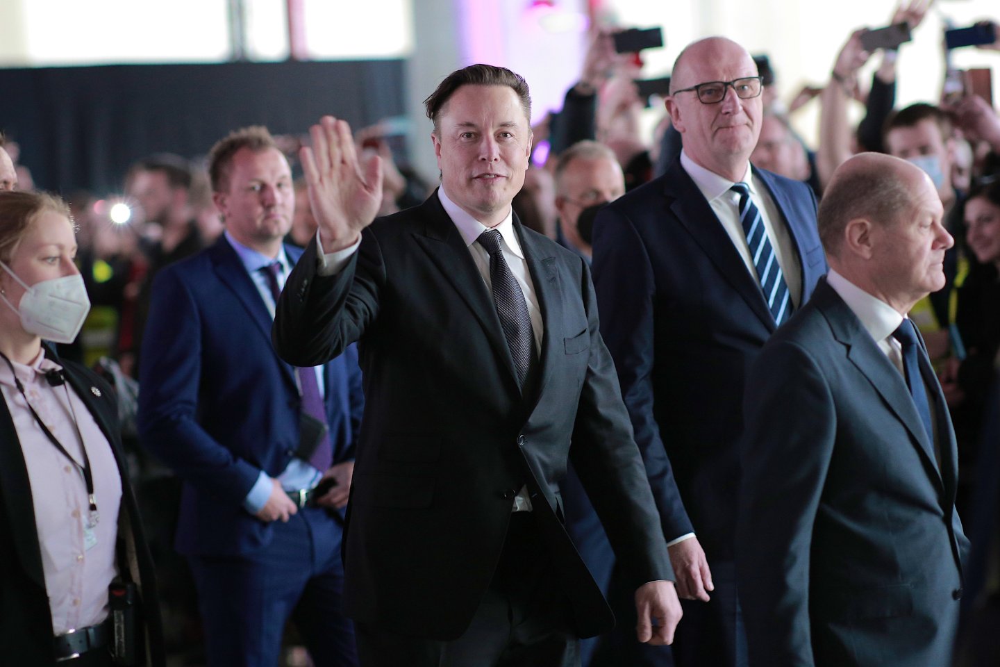 GRUENHEIDE, GERMANY &#8211; MARCH 22: German Chancellor Olaf Scholz (R), Brandenburg State Premier Dietmar Woidke (2ndR) and Tesla CEO Elon Musk (C) attend the official opening of the new Tesla electric car manufacturing plant on March 22, 2022 near Gruenheide, Germany. The new plant, officially called the Gigafactory Berlin-Brandenburg, is producing the Model Y as well as electric car batteries. (Photo by Christian Marquardt &#8211; Pool/Getty Images)