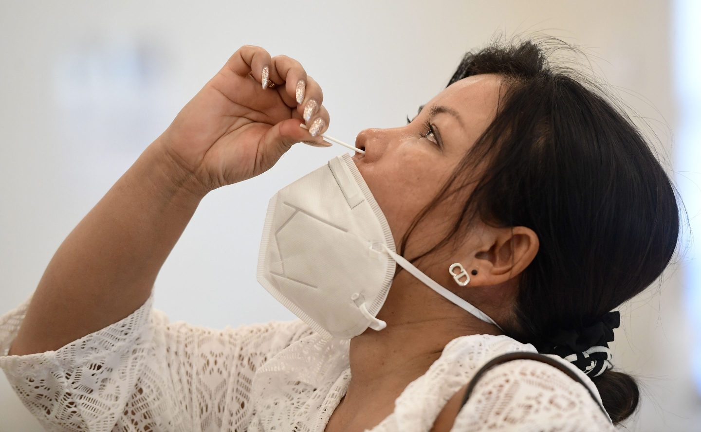 Woman gets COVID-19 test